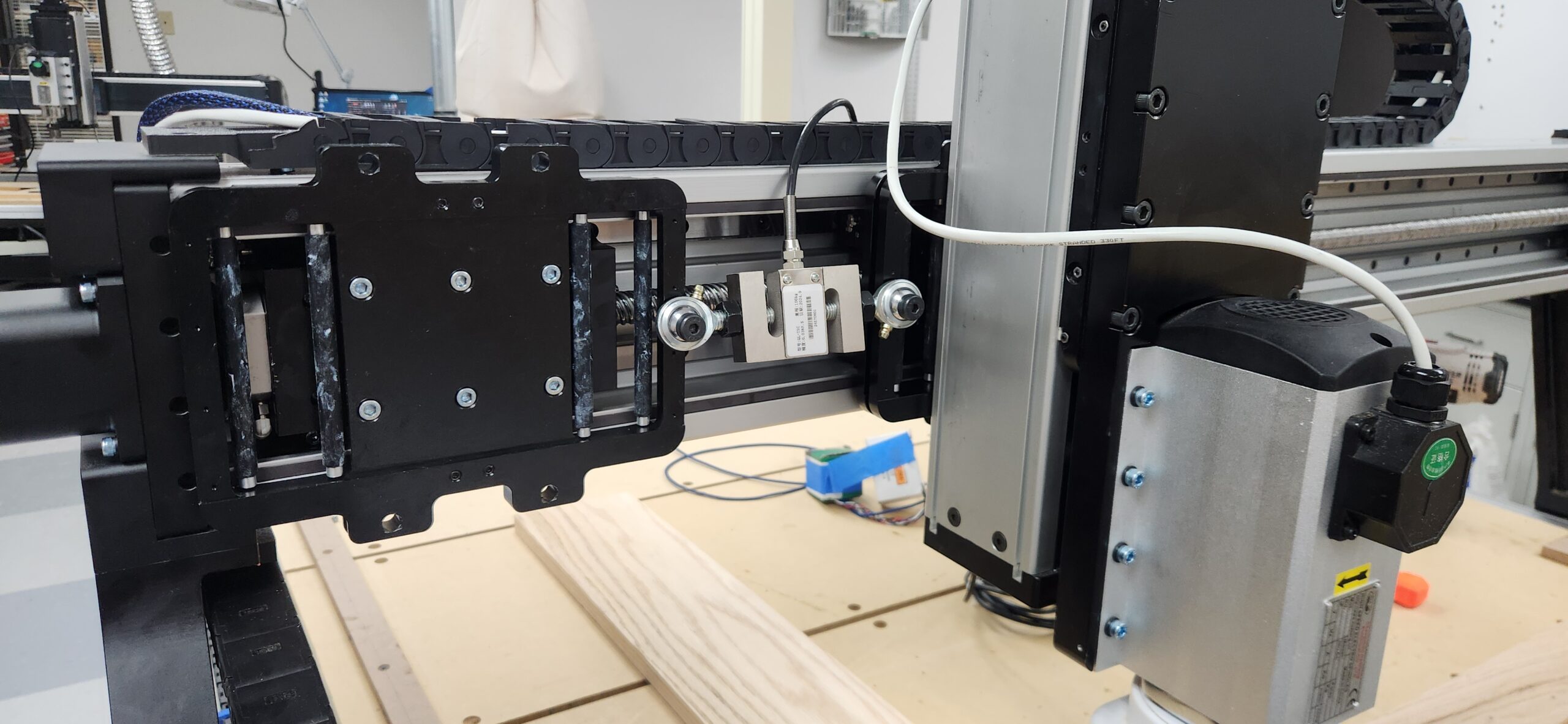 Fusion CNC push-pull gauge test measuring carriage force during cutting and free motion